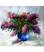 purple Flowers in a blue vase 