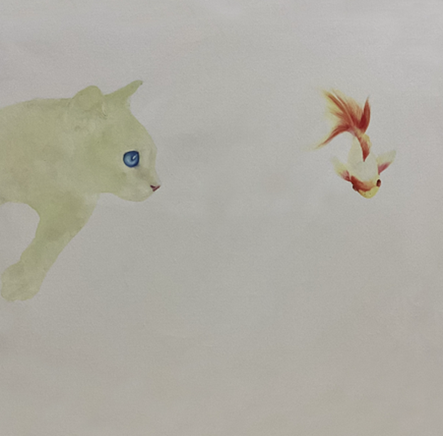 Cat playing with fish